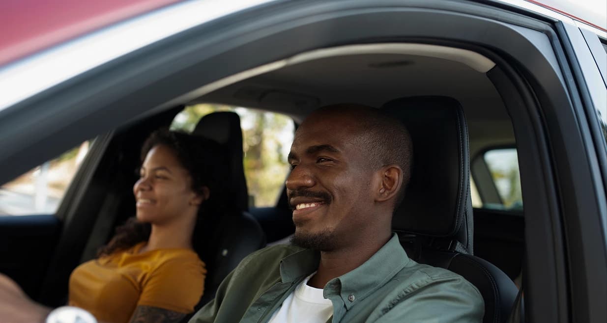 driver with happy passengers, carrb ng
